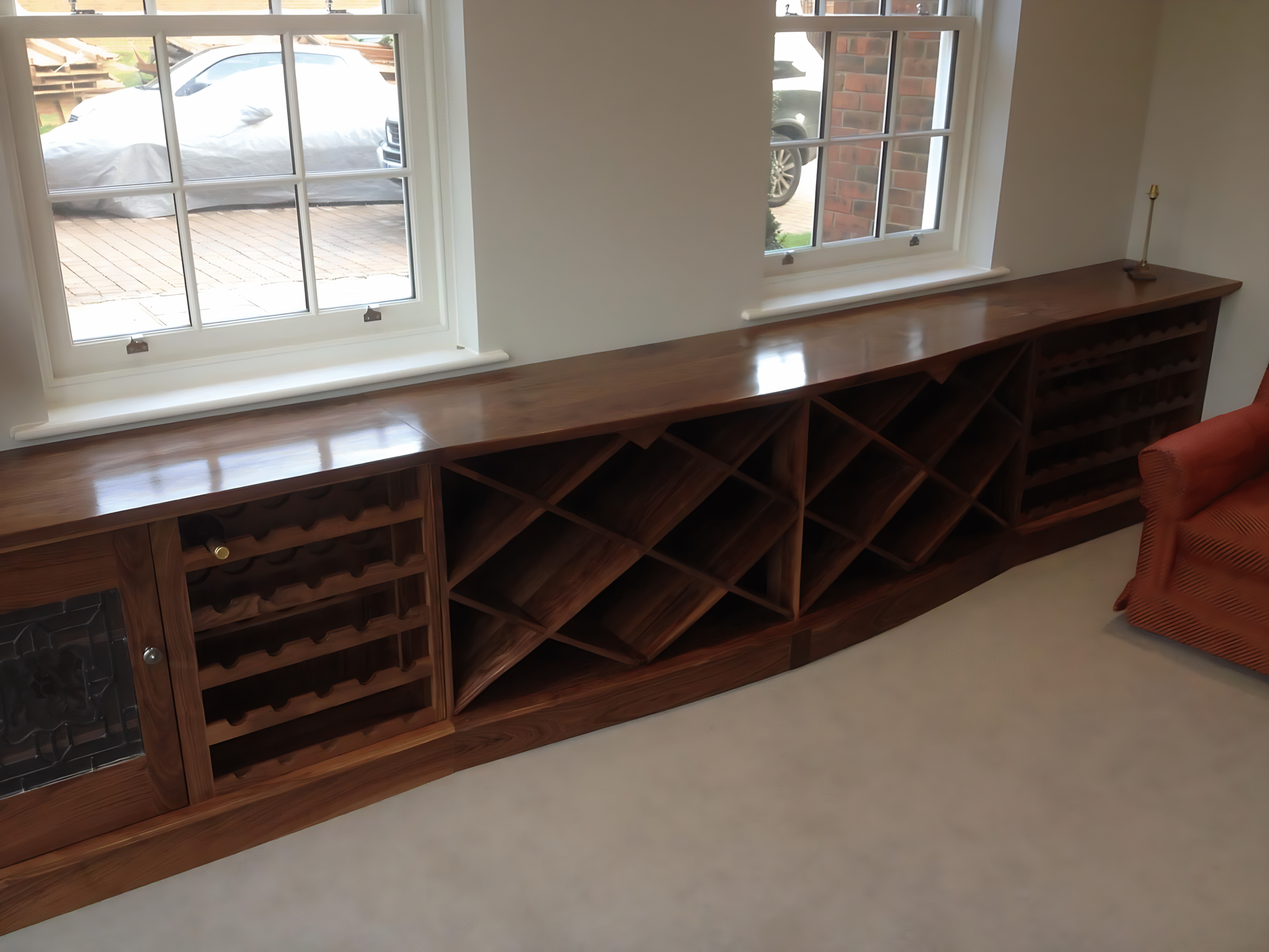 A media unit fitted under a window in a home in Horsham by Adam Harman