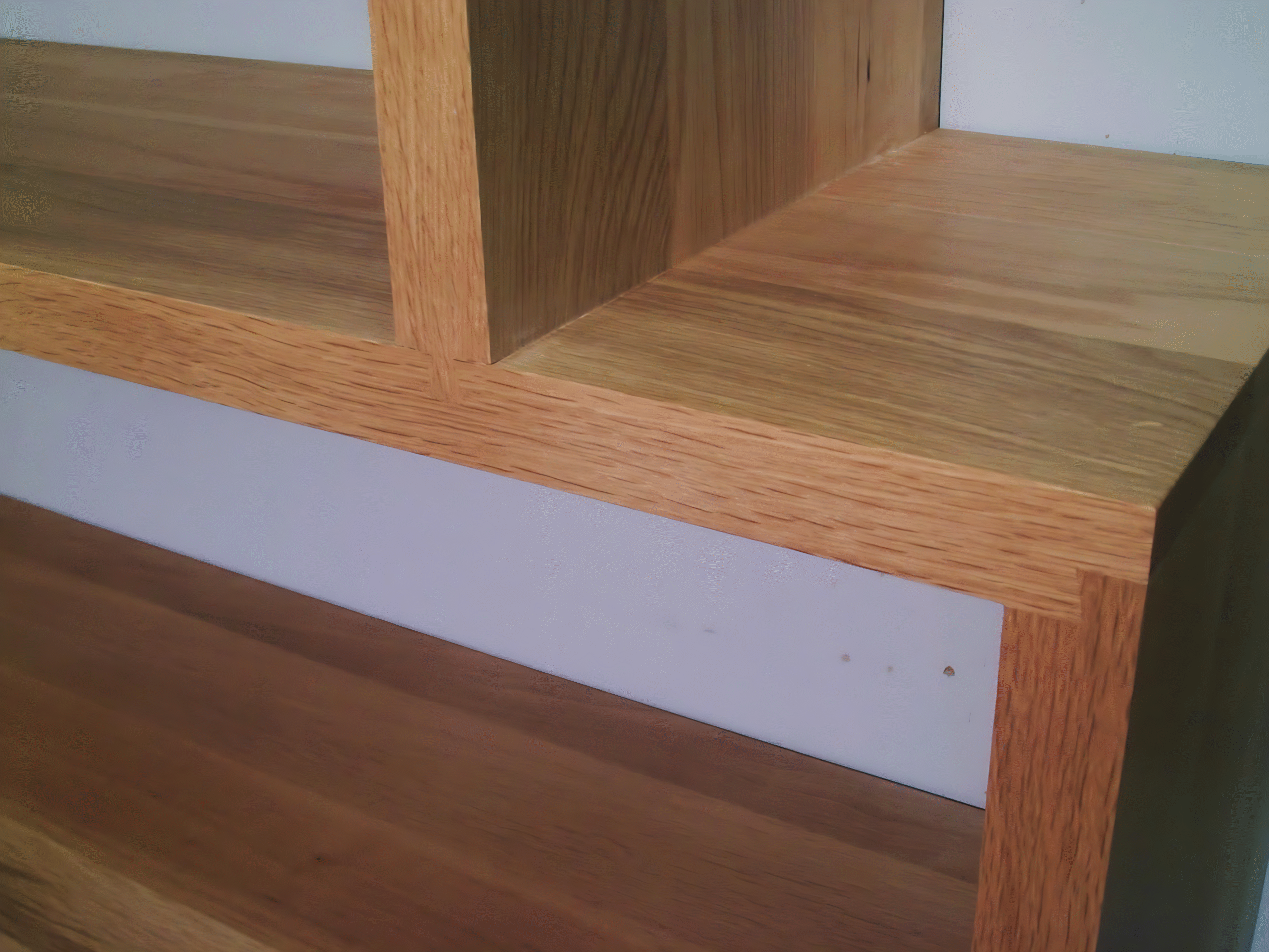 A storage unit in a living room in Horsham fitted by Adam Harman