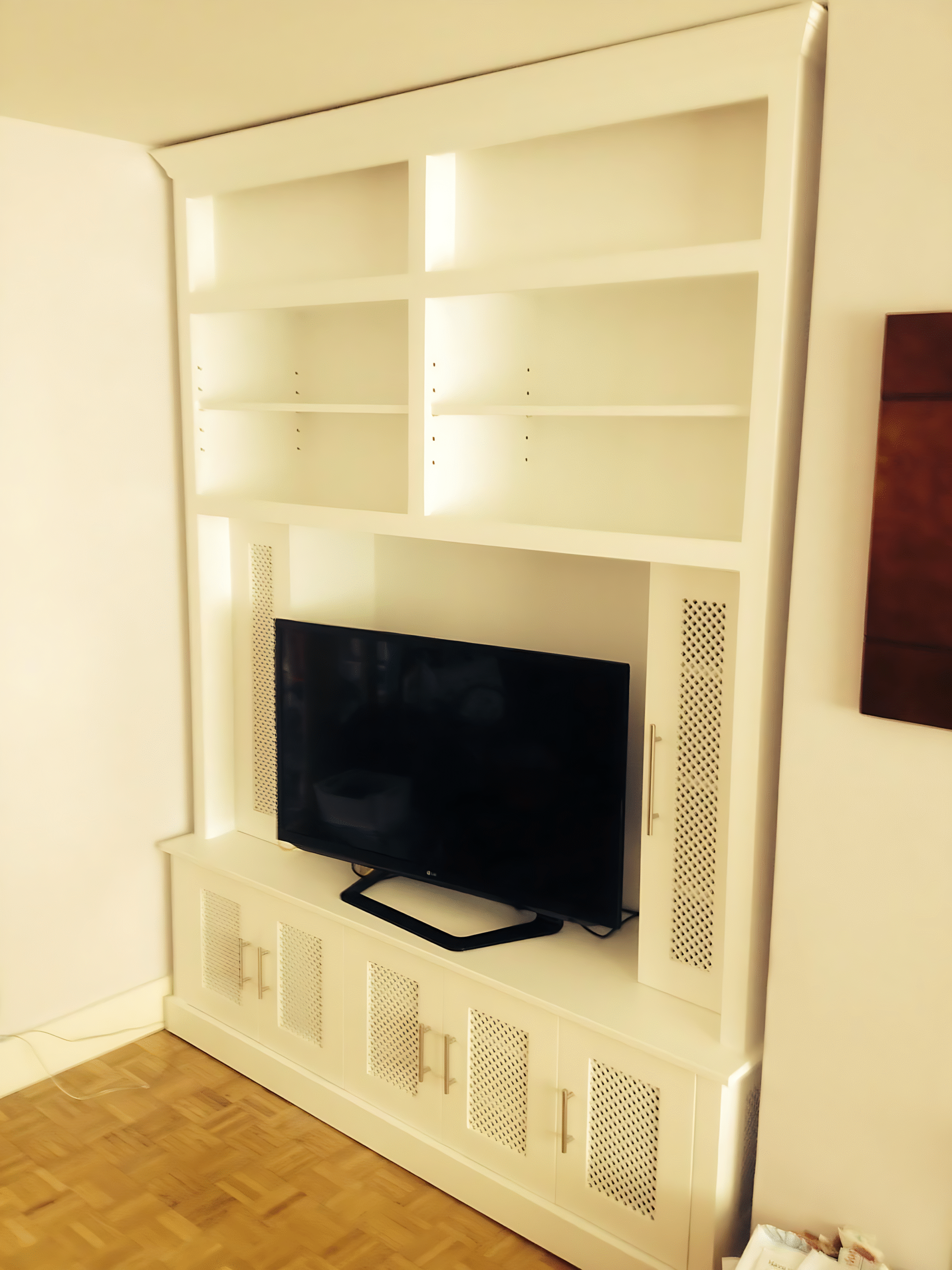 A media unit in a living room in Horsham fitted by Adam Harman
